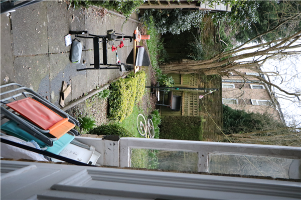 Wet-layup CFRP fincan sanding in the garden