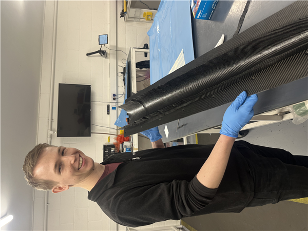Nosecone pre-preg being laid up in custom split-mold.