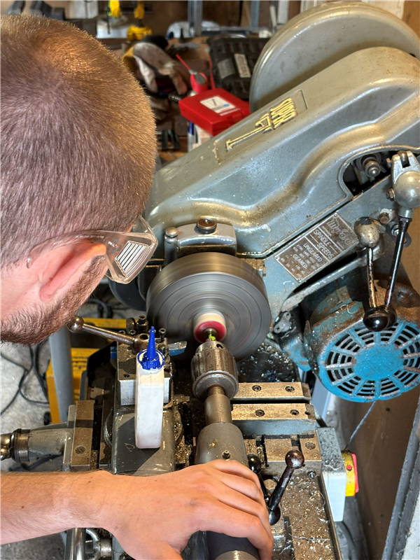 Modifying the printed(!) inducer on my lathe.
